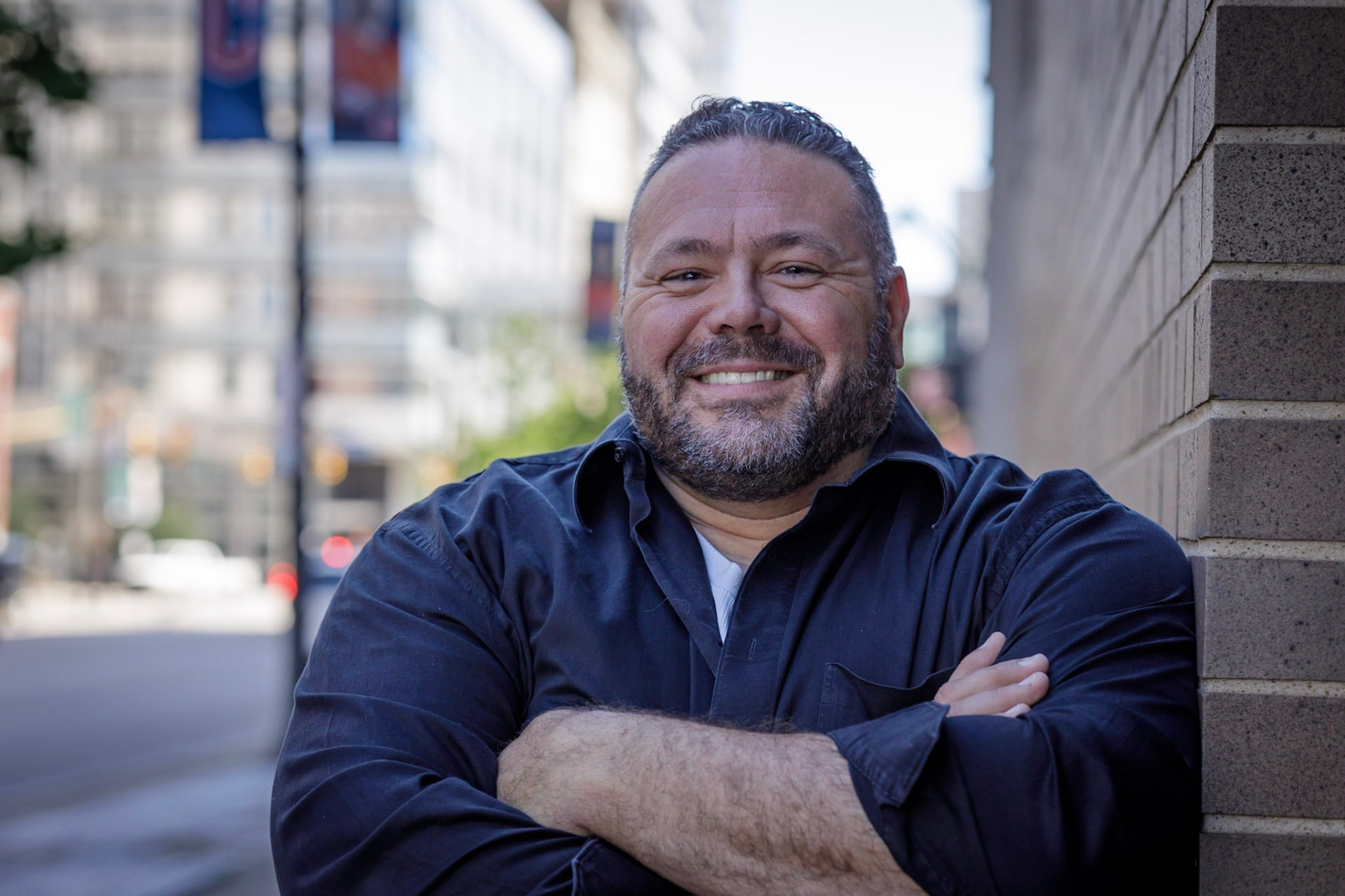 Andy Rigda, Cleveland-area mortgage advisor, outdoors in the city